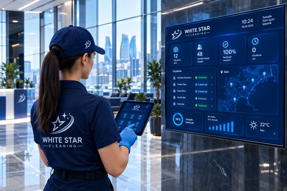 White Star Cleaning staff member in a modern office with a live monitoring screen